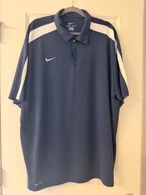 Nike Men's Navy Blue Polo with White Shoulder Stripes